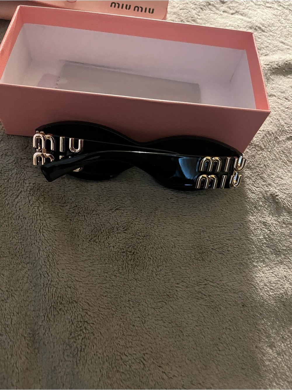 Miu Miu Black Sunglasses with Gold Logo Accents